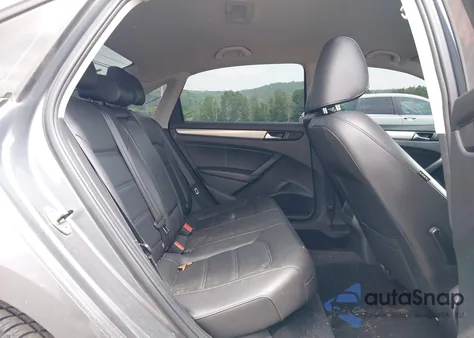 2014 Volkswagen Passat 1.8T Wolfsburg Edition z USA, uszkodzony, nr VIN 1VWAT7A34EC115846